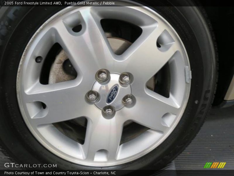 Pueblo Gold Metallic / Pebble 2005 Ford Freestyle Limited AWD