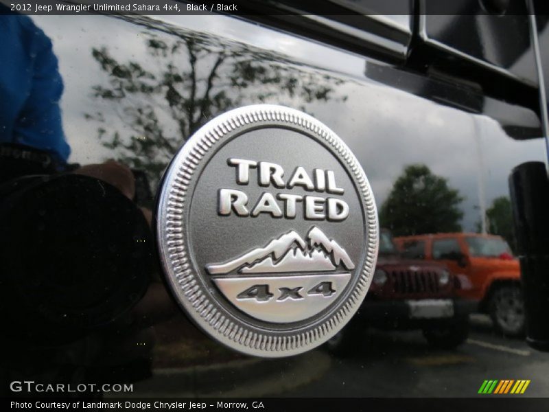 Black / Black 2012 Jeep Wrangler Unlimited Sahara 4x4