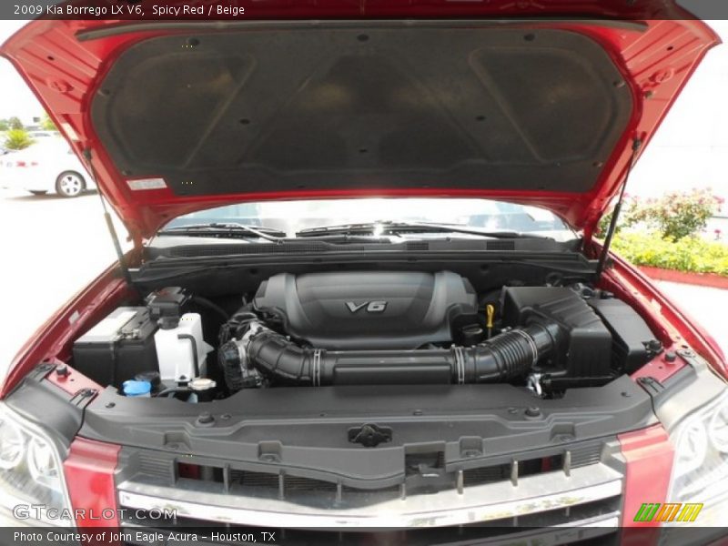 Spicy Red / Beige 2009 Kia Borrego LX V6