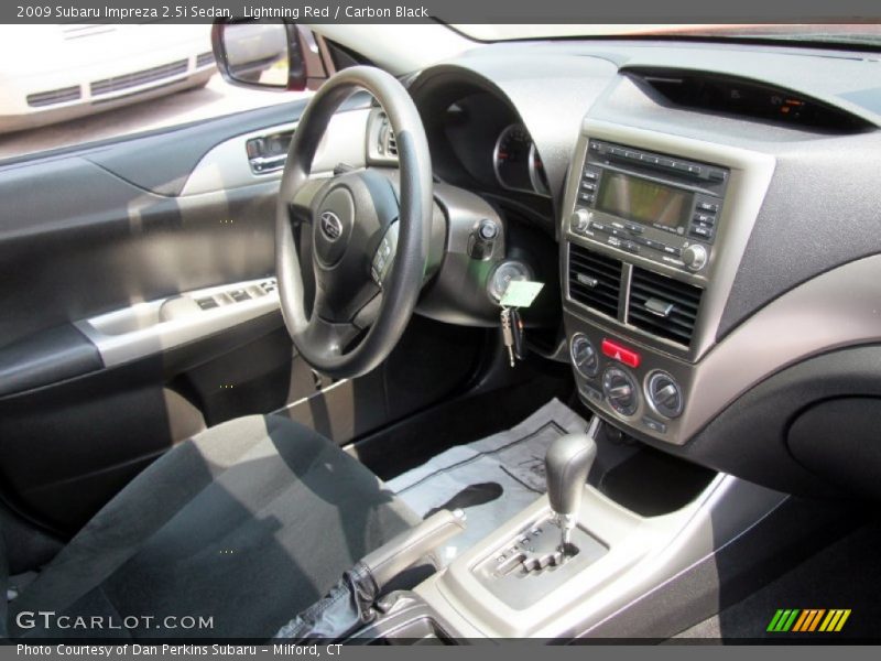 Lightning Red / Carbon Black 2009 Subaru Impreza 2.5i Sedan