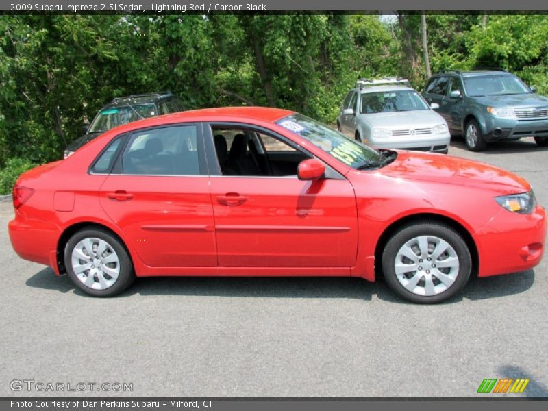 Lightning Red / Carbon Black 2009 Subaru Impreza 2.5i Sedan
