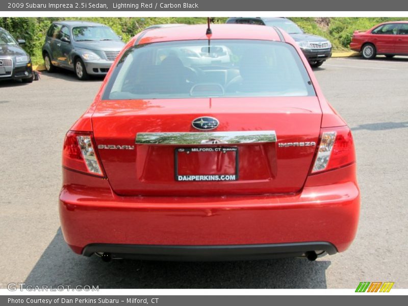 Lightning Red / Carbon Black 2009 Subaru Impreza 2.5i Sedan