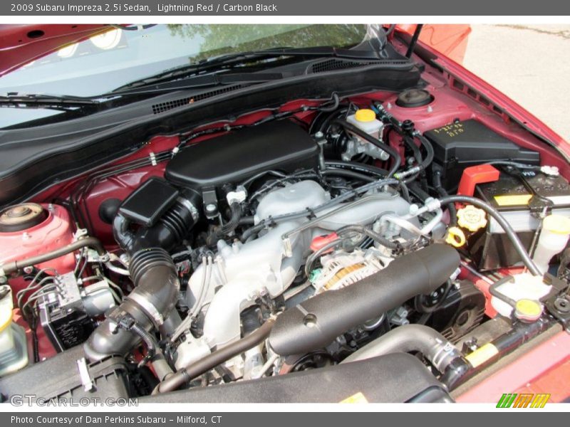 Lightning Red / Carbon Black 2009 Subaru Impreza 2.5i Sedan