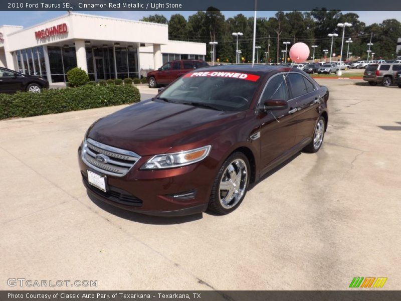 Cinnamon Red Metallic / Light Stone 2010 Ford Taurus SEL