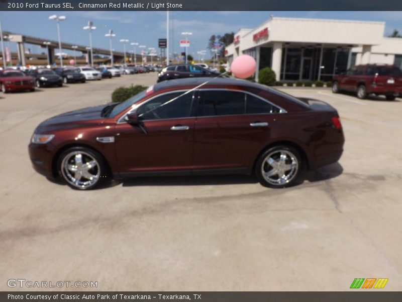 Cinnamon Red Metallic / Light Stone 2010 Ford Taurus SEL