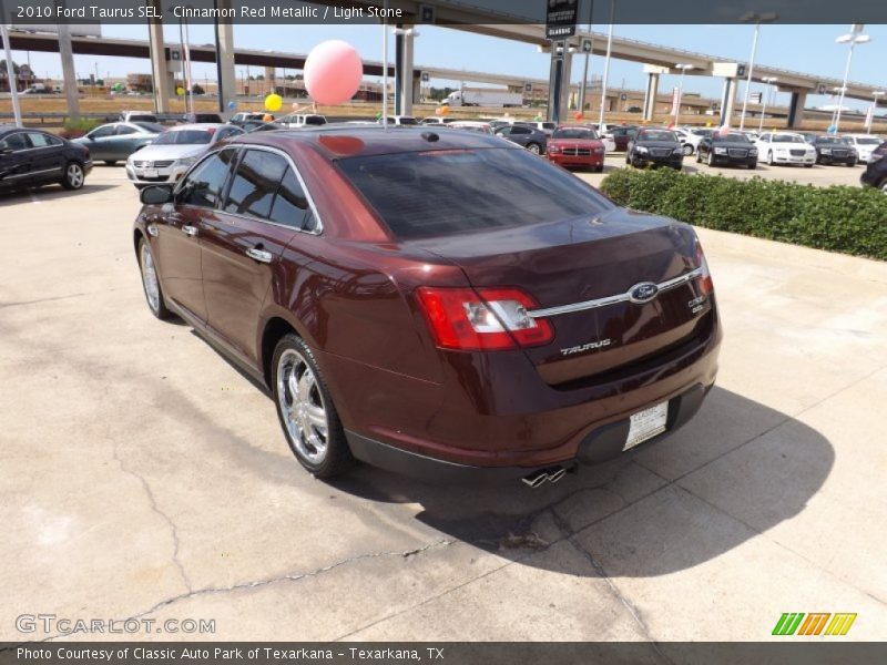 Cinnamon Red Metallic / Light Stone 2010 Ford Taurus SEL