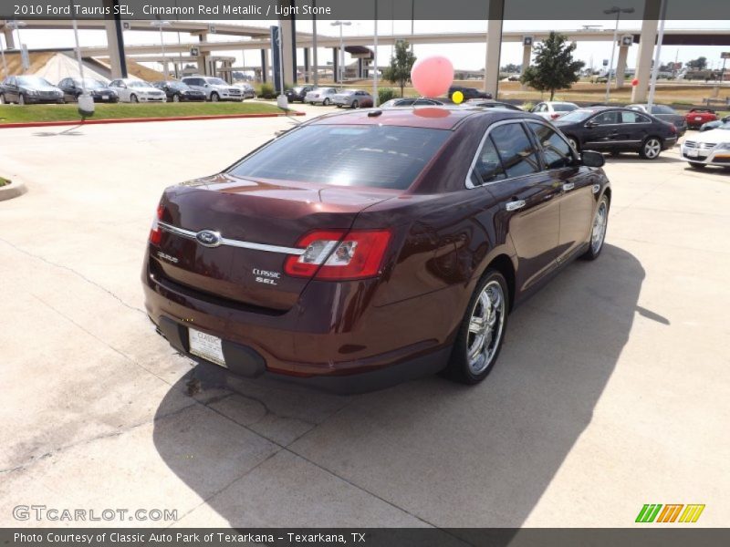 Cinnamon Red Metallic / Light Stone 2010 Ford Taurus SEL