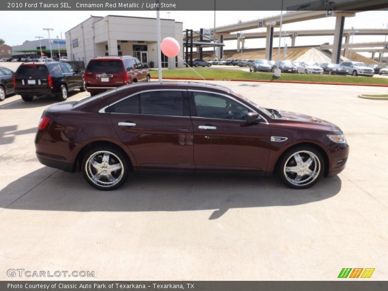 Cinnamon Red Metallic / Light Stone 2010 Ford Taurus SEL