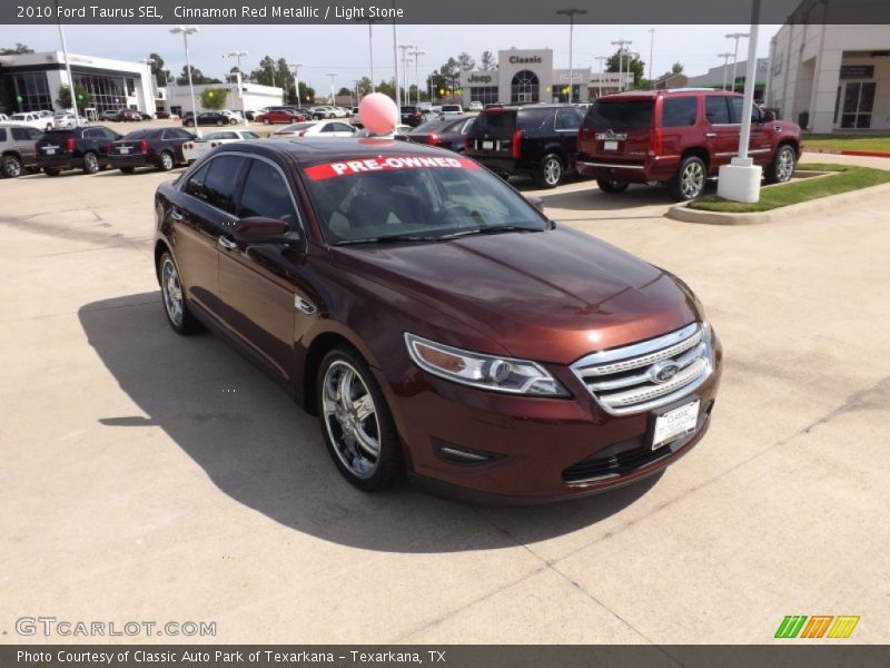 Cinnamon Red Metallic / Light Stone 2010 Ford Taurus SEL