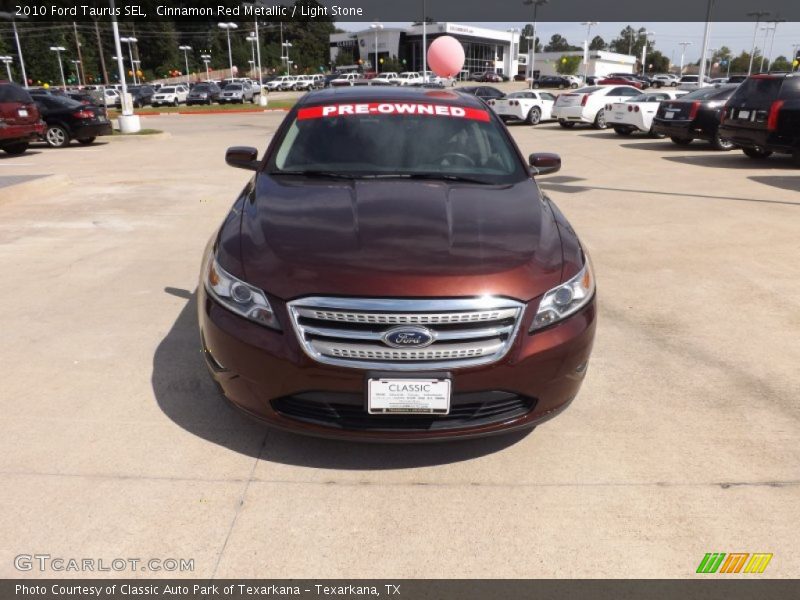 Cinnamon Red Metallic / Light Stone 2010 Ford Taurus SEL