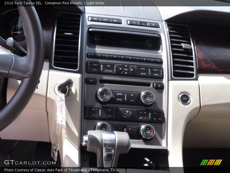 Cinnamon Red Metallic / Light Stone 2010 Ford Taurus SEL