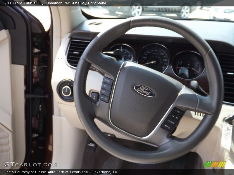Cinnamon Red Metallic / Light Stone 2010 Ford Taurus SEL