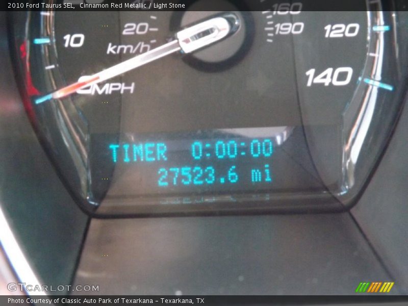 Cinnamon Red Metallic / Light Stone 2010 Ford Taurus SEL