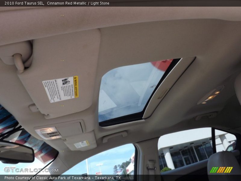 Cinnamon Red Metallic / Light Stone 2010 Ford Taurus SEL