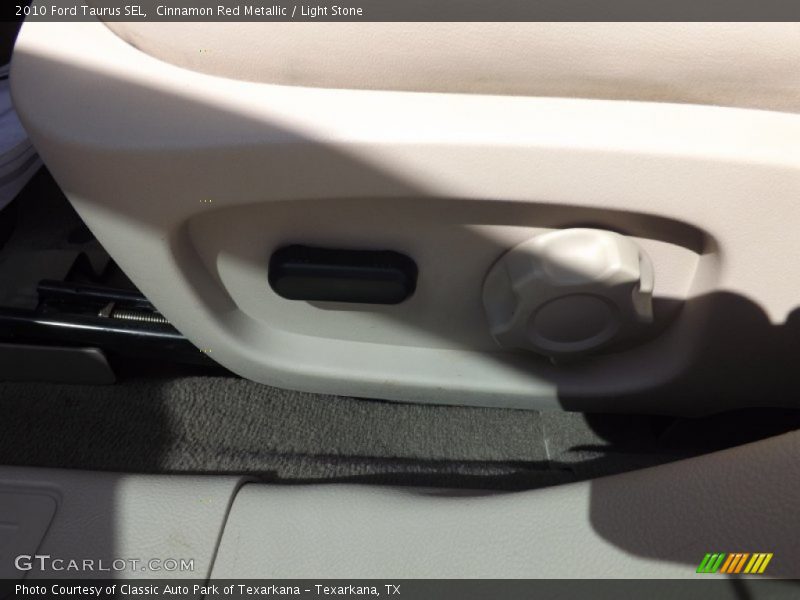 Cinnamon Red Metallic / Light Stone 2010 Ford Taurus SEL