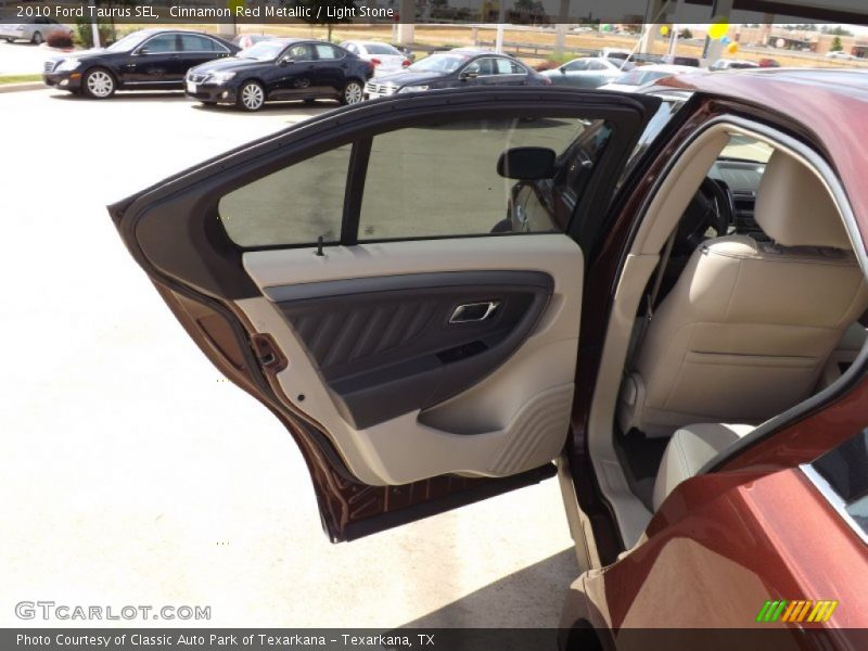 Cinnamon Red Metallic / Light Stone 2010 Ford Taurus SEL