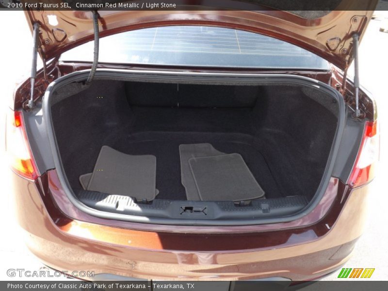 Cinnamon Red Metallic / Light Stone 2010 Ford Taurus SEL
