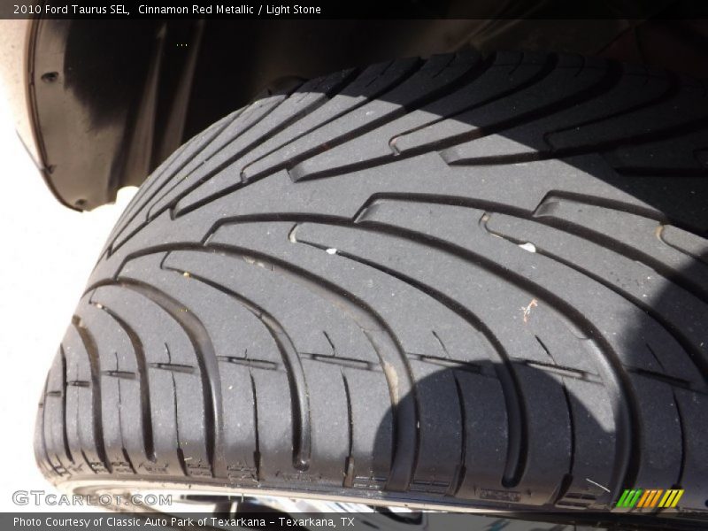 Cinnamon Red Metallic / Light Stone 2010 Ford Taurus SEL