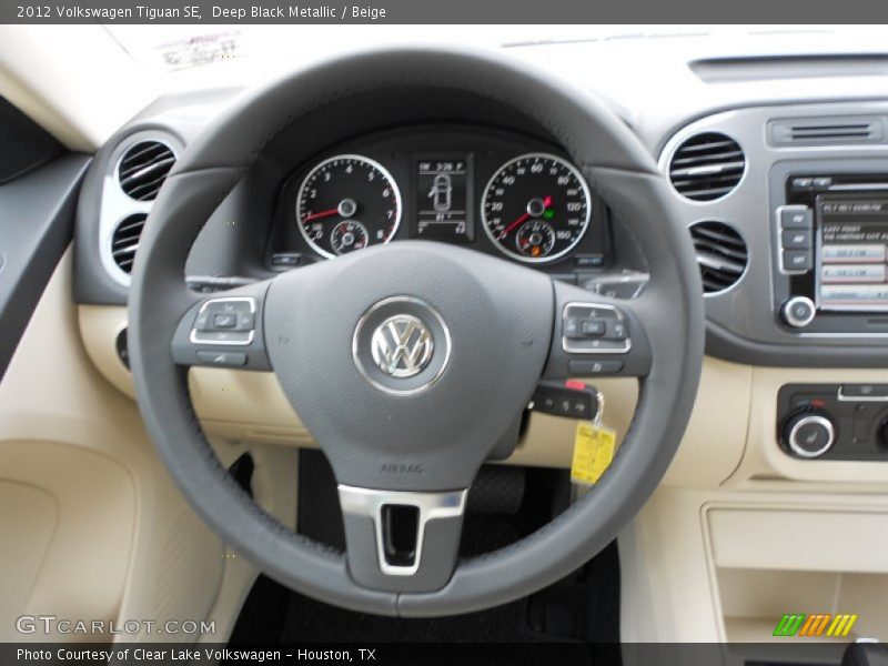Deep Black Metallic / Beige 2012 Volkswagen Tiguan SE
