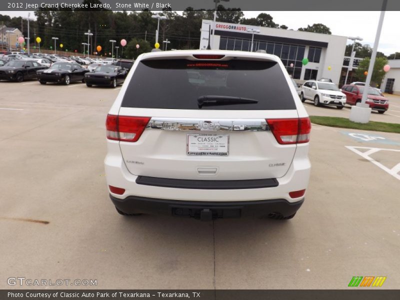 Stone White / Black 2012 Jeep Grand Cherokee Laredo