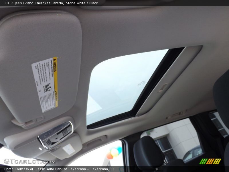 Stone White / Black 2012 Jeep Grand Cherokee Laredo