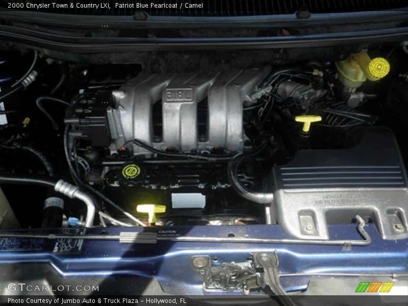 Patriot Blue Pearlcoat / Camel 2000 Chrysler Town & Country LXi