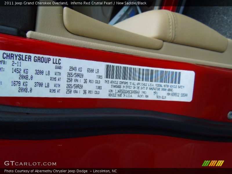 Inferno Red Crystal Pearl / New Saddle/Black 2011 Jeep Grand Cherokee Overland