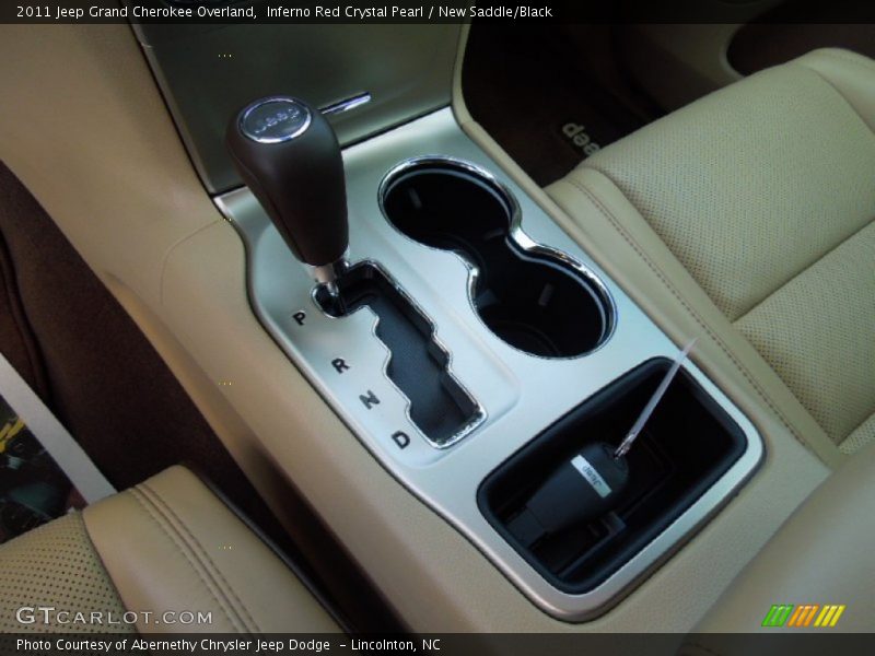 Inferno Red Crystal Pearl / New Saddle/Black 2011 Jeep Grand Cherokee Overland