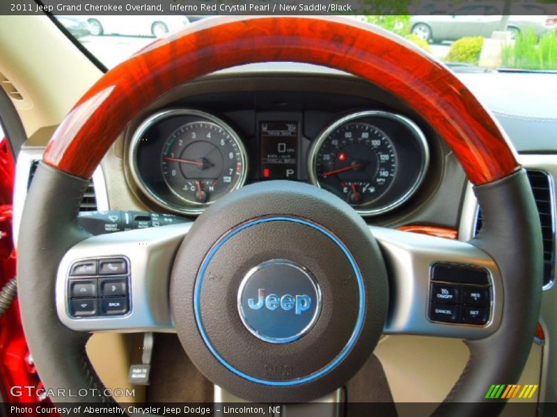 Inferno Red Crystal Pearl / New Saddle/Black 2011 Jeep Grand Cherokee Overland