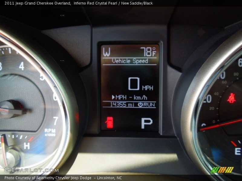 Inferno Red Crystal Pearl / New Saddle/Black 2011 Jeep Grand Cherokee Overland