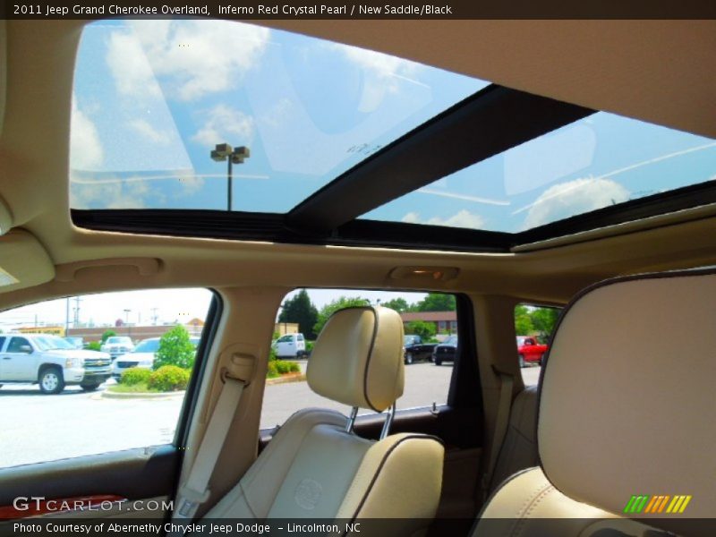 Inferno Red Crystal Pearl / New Saddle/Black 2011 Jeep Grand Cherokee Overland