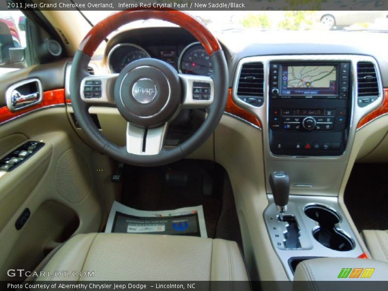 Inferno Red Crystal Pearl / New Saddle/Black 2011 Jeep Grand Cherokee Overland
