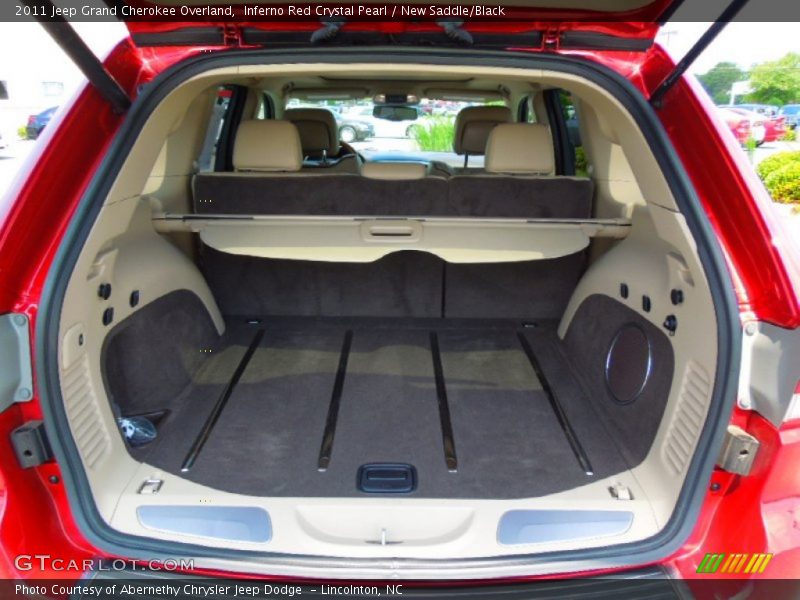 Inferno Red Crystal Pearl / New Saddle/Black 2011 Jeep Grand Cherokee Overland