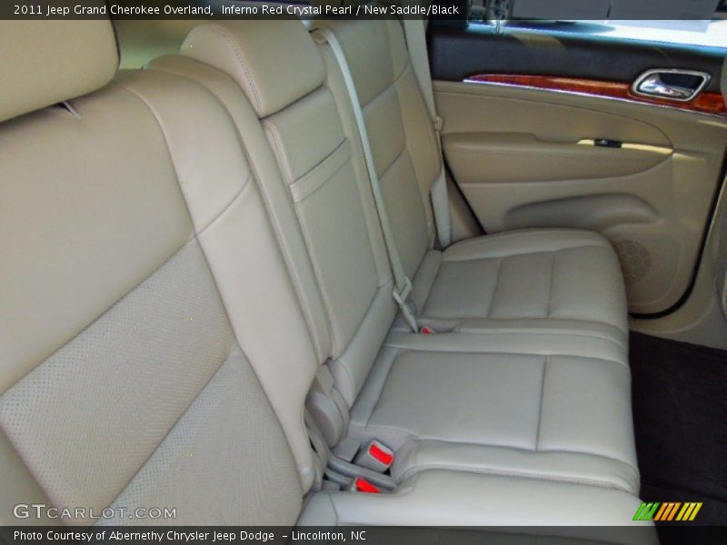Inferno Red Crystal Pearl / New Saddle/Black 2011 Jeep Grand Cherokee Overland