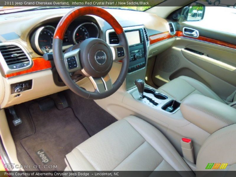 Inferno Red Crystal Pearl / New Saddle/Black 2011 Jeep Grand Cherokee Overland