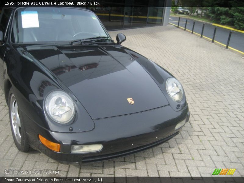 Black / Black 1995 Porsche 911 Carrera 4 Cabriolet