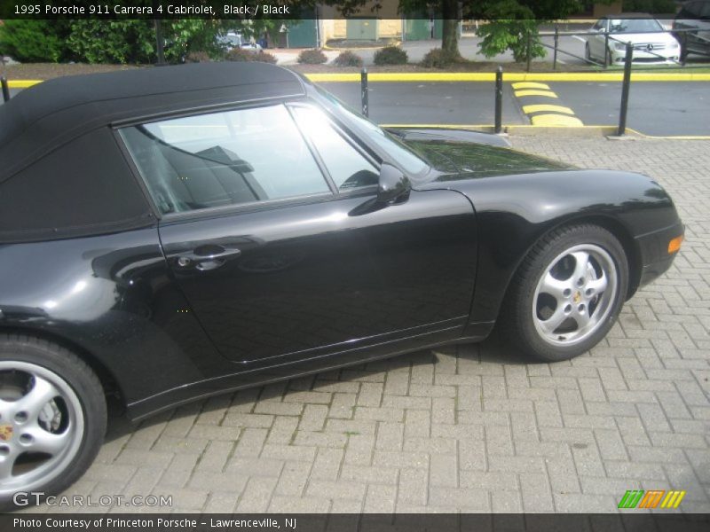 Black / Black 1995 Porsche 911 Carrera 4 Cabriolet