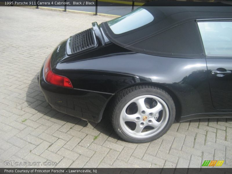 Black / Black 1995 Porsche 911 Carrera 4 Cabriolet