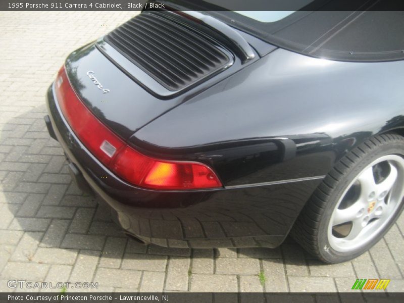 Black / Black 1995 Porsche 911 Carrera 4 Cabriolet