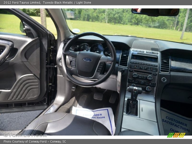 Tuxedo Black Metallic / Light Stone 2012 Ford Taurus Limited