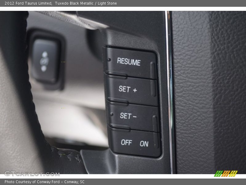 Tuxedo Black Metallic / Light Stone 2012 Ford Taurus Limited