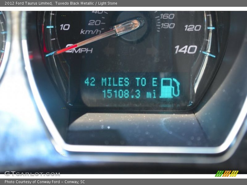 Tuxedo Black Metallic / Light Stone 2012 Ford Taurus Limited
