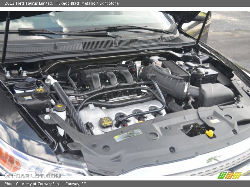 Tuxedo Black Metallic / Light Stone 2012 Ford Taurus Limited