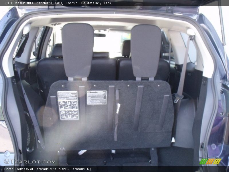Cosmic Blue Metallic / Black 2010 Mitsubishi Outlander SE 4WD