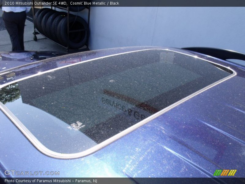 Cosmic Blue Metallic / Black 2010 Mitsubishi Outlander SE 4WD