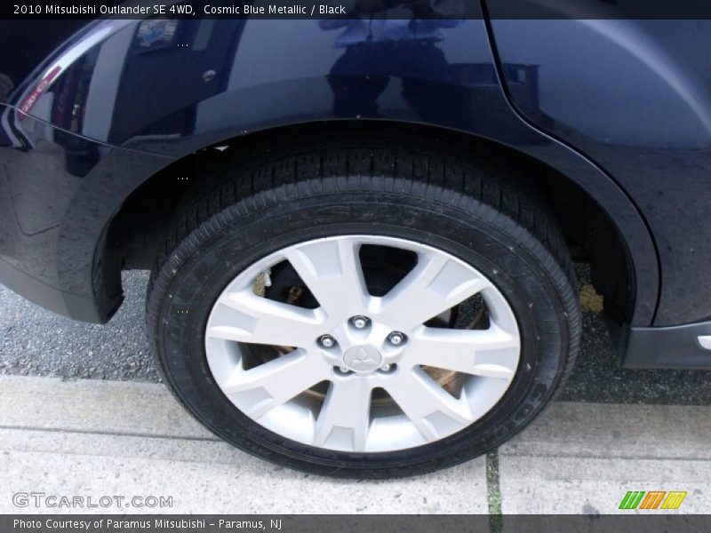 Cosmic Blue Metallic / Black 2010 Mitsubishi Outlander SE 4WD