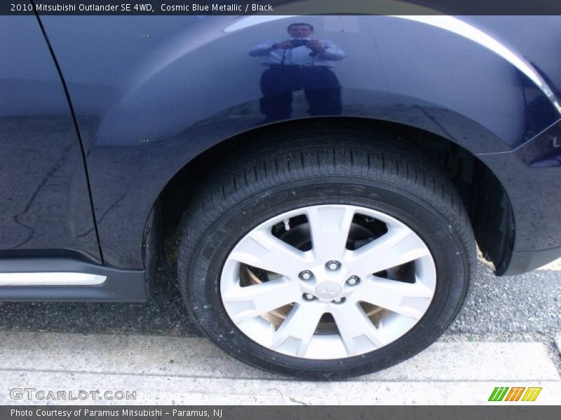 Cosmic Blue Metallic / Black 2010 Mitsubishi Outlander SE 4WD