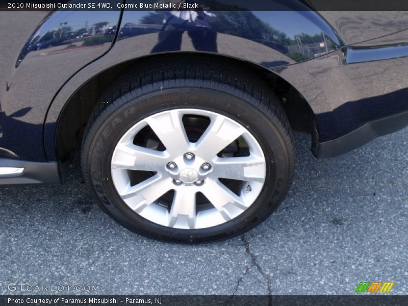 Cosmic Blue Metallic / Black 2010 Mitsubishi Outlander SE 4WD