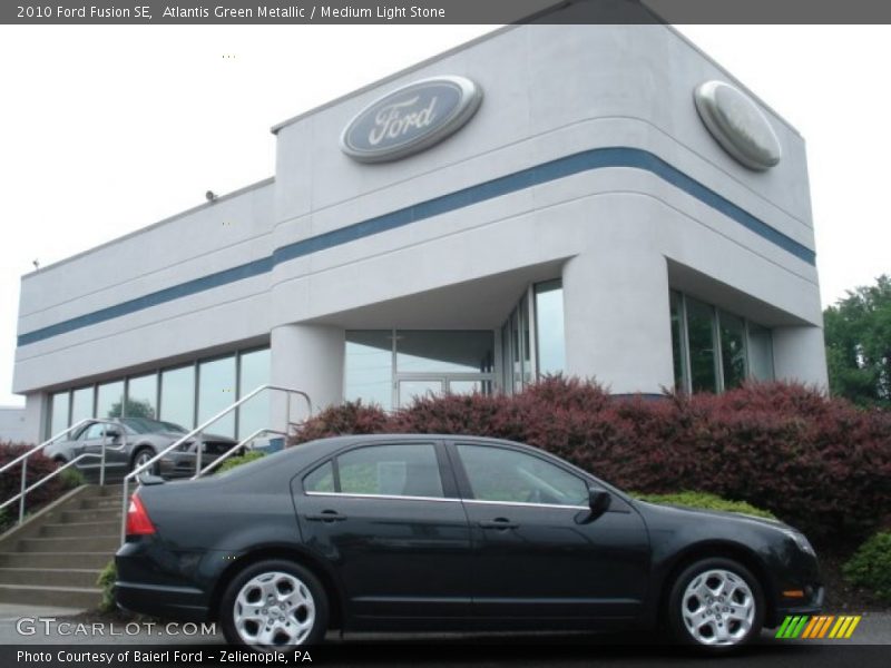 Atlantis Green Metallic / Medium Light Stone 2010 Ford Fusion SE