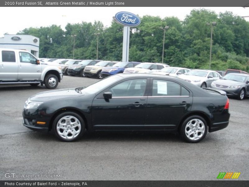 Atlantis Green Metallic / Medium Light Stone 2010 Ford Fusion SE